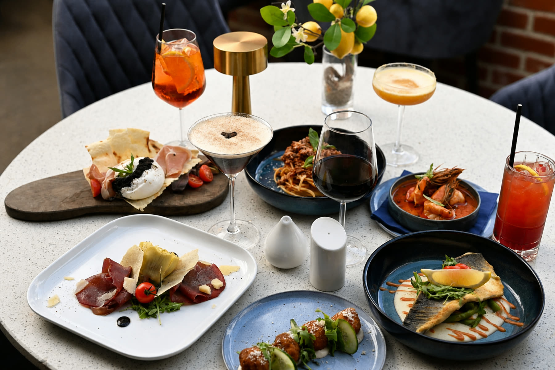 Sharing plates and cocktails at Cena Italian